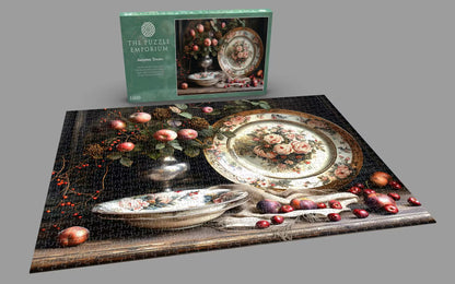 Jigsaw puzzle with decorative plates and fruits, accompanied by the packaging on a gray background