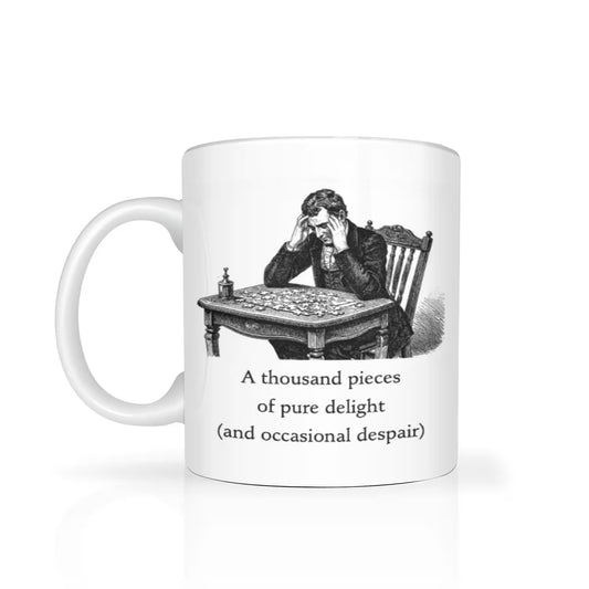 "a thousand pieces of pure delight (and occasional dispair)" text on white ceramic mug