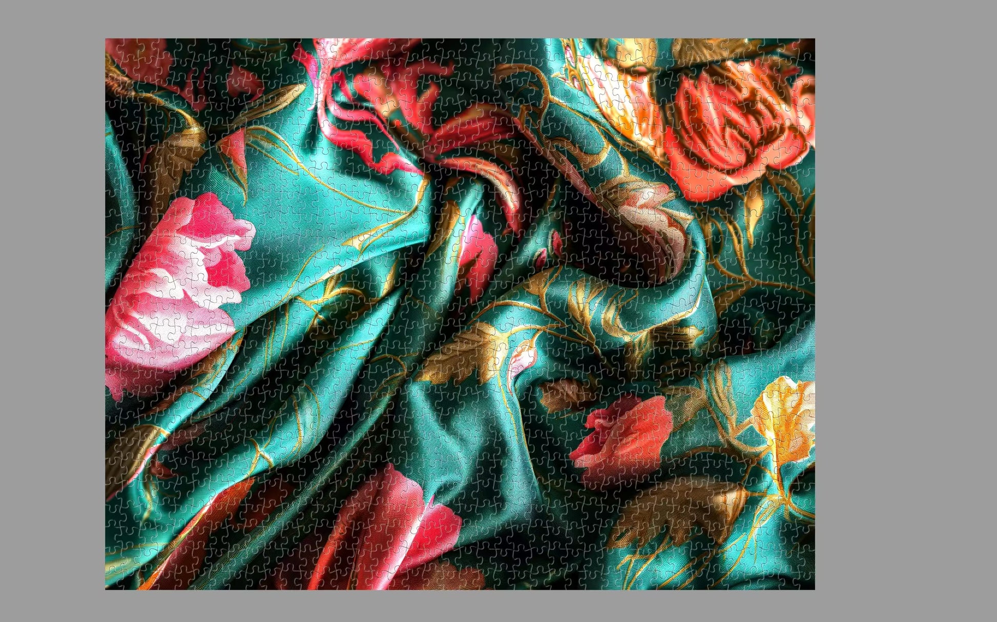 Close-up of colorful fabric with floral patterns on a gray background