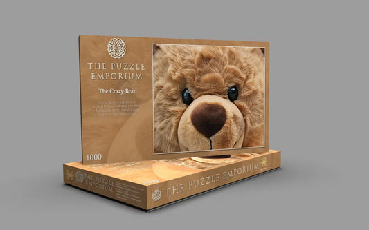 Puzzle box of a bear with 'The Puzzle Emporium' branding on a gray background
