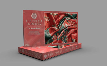 Jigsaw puzzle box from The Puzzle Emporium with floral design on a gray background