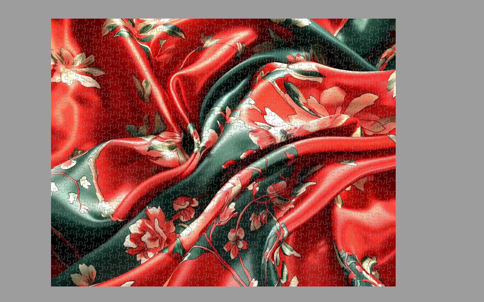 Close-up of red and green fabric with floral patterns