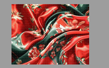 Close-up of red and green fabric with floral patterns