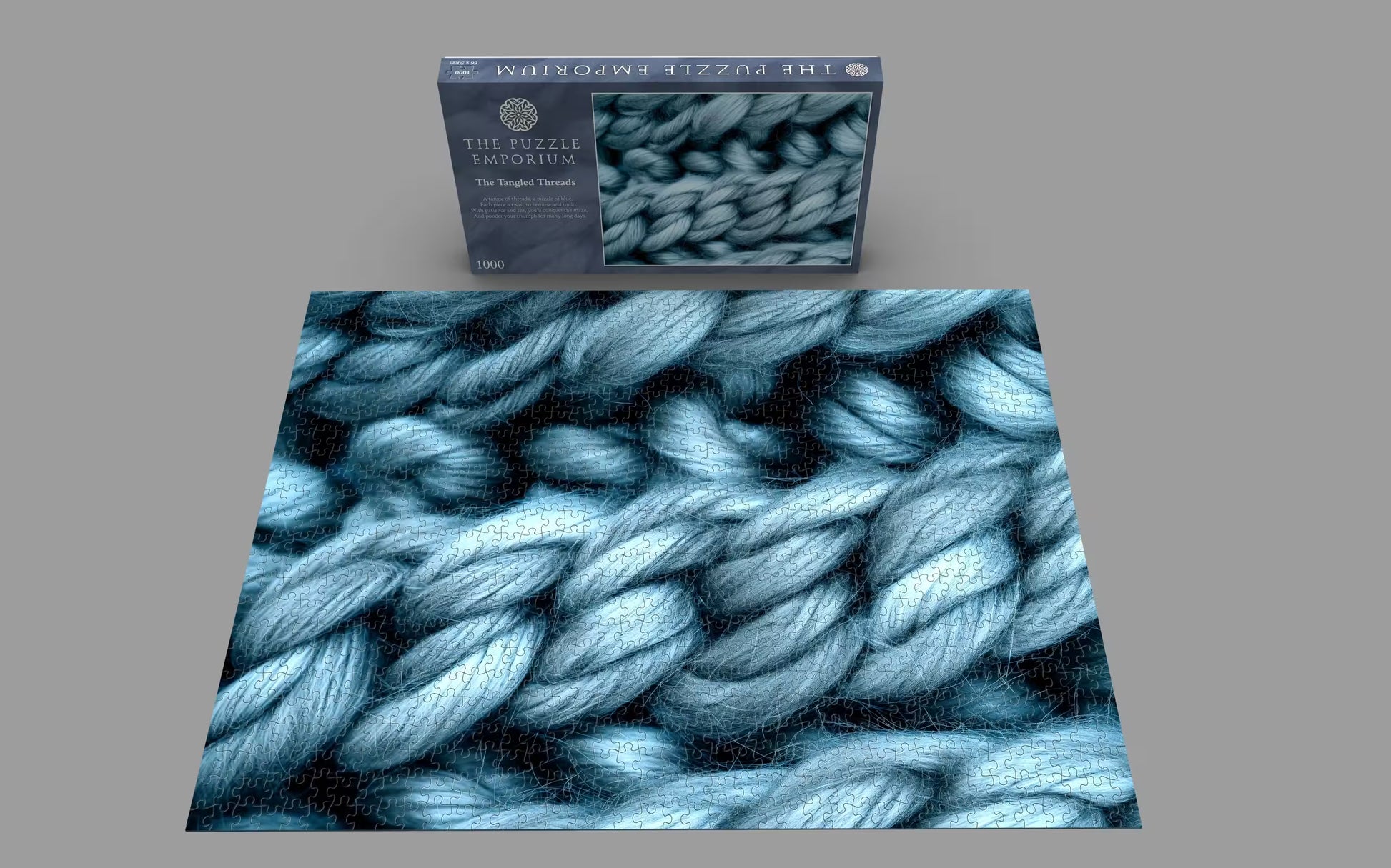 Blue yarn with a packaging box labeled 'Woolly & Swirly' on a gray background