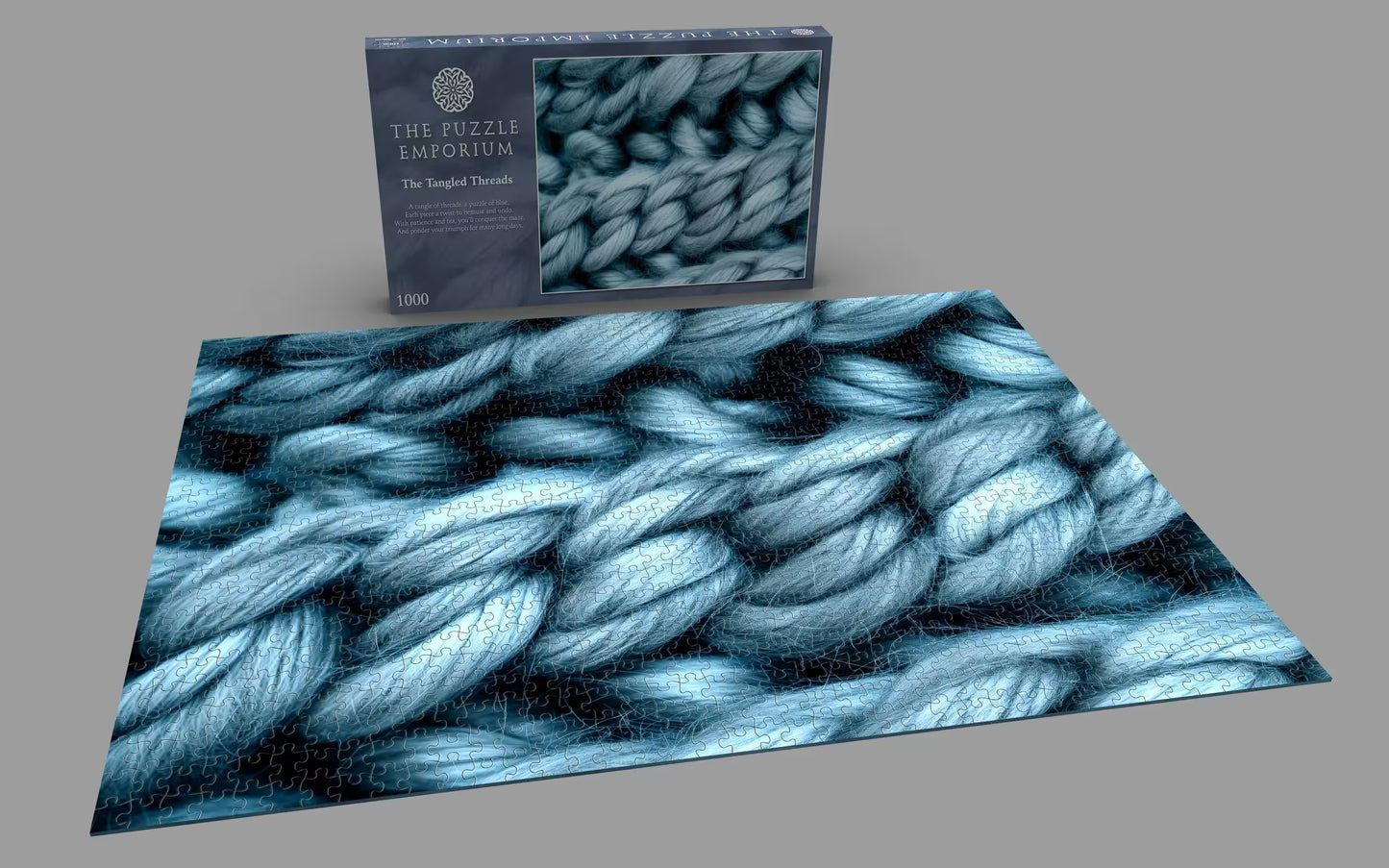 Jigsaw puzzle with blue yarn pattern and packaging on a gray background