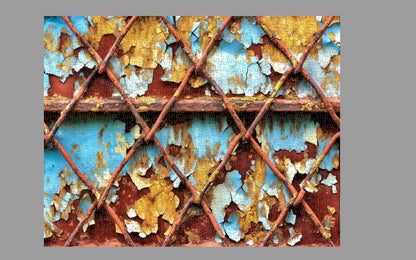 Rust and peeling paint on a metal grid