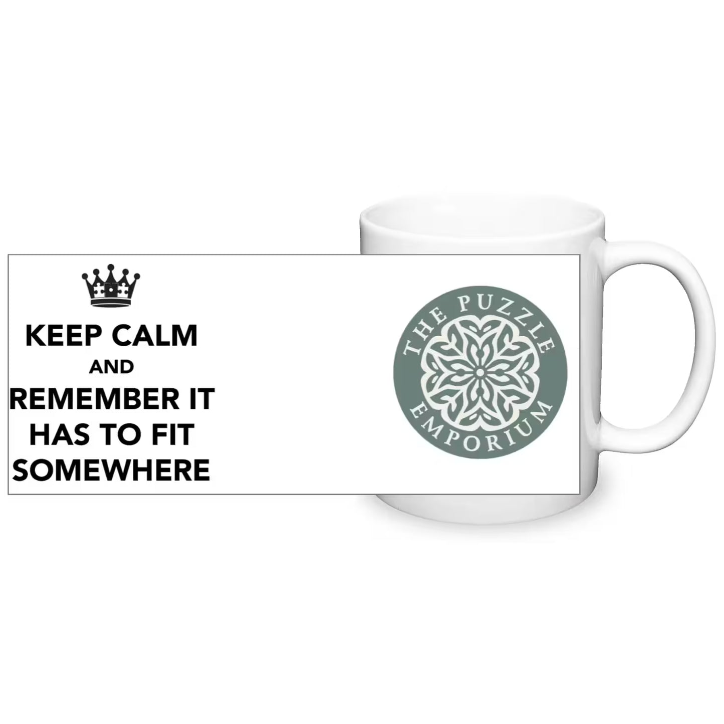 White mug with 'The Puzzle Emporium' logo and text 'Keep Calm and Remember It Has to Fit Somewhere'.
