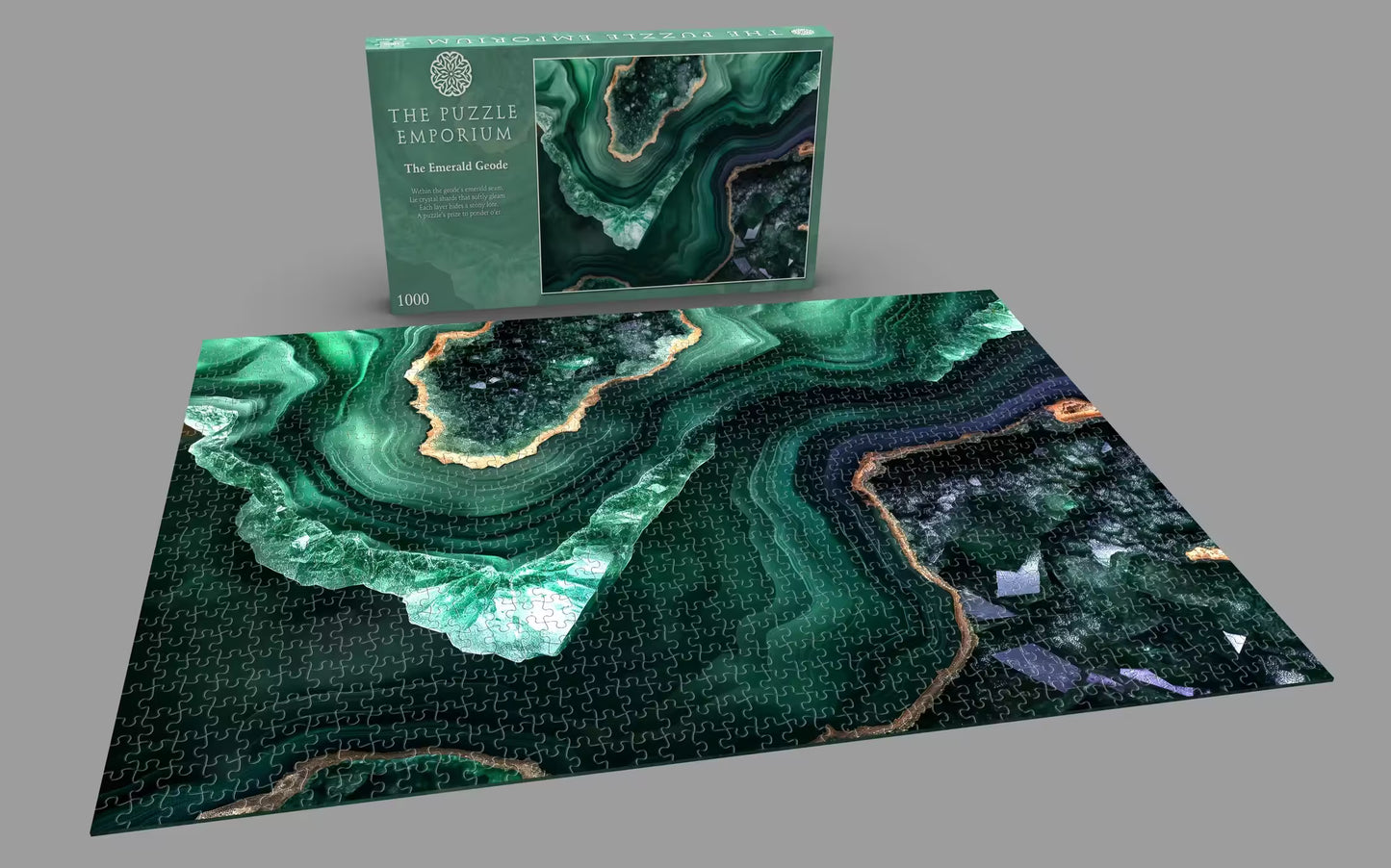 Jigsaw puzzle with green agate design and packaging on a gray background